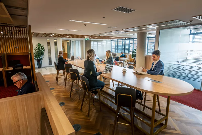 2024_Database Image_workers on large table_31Nishi Building.jpg